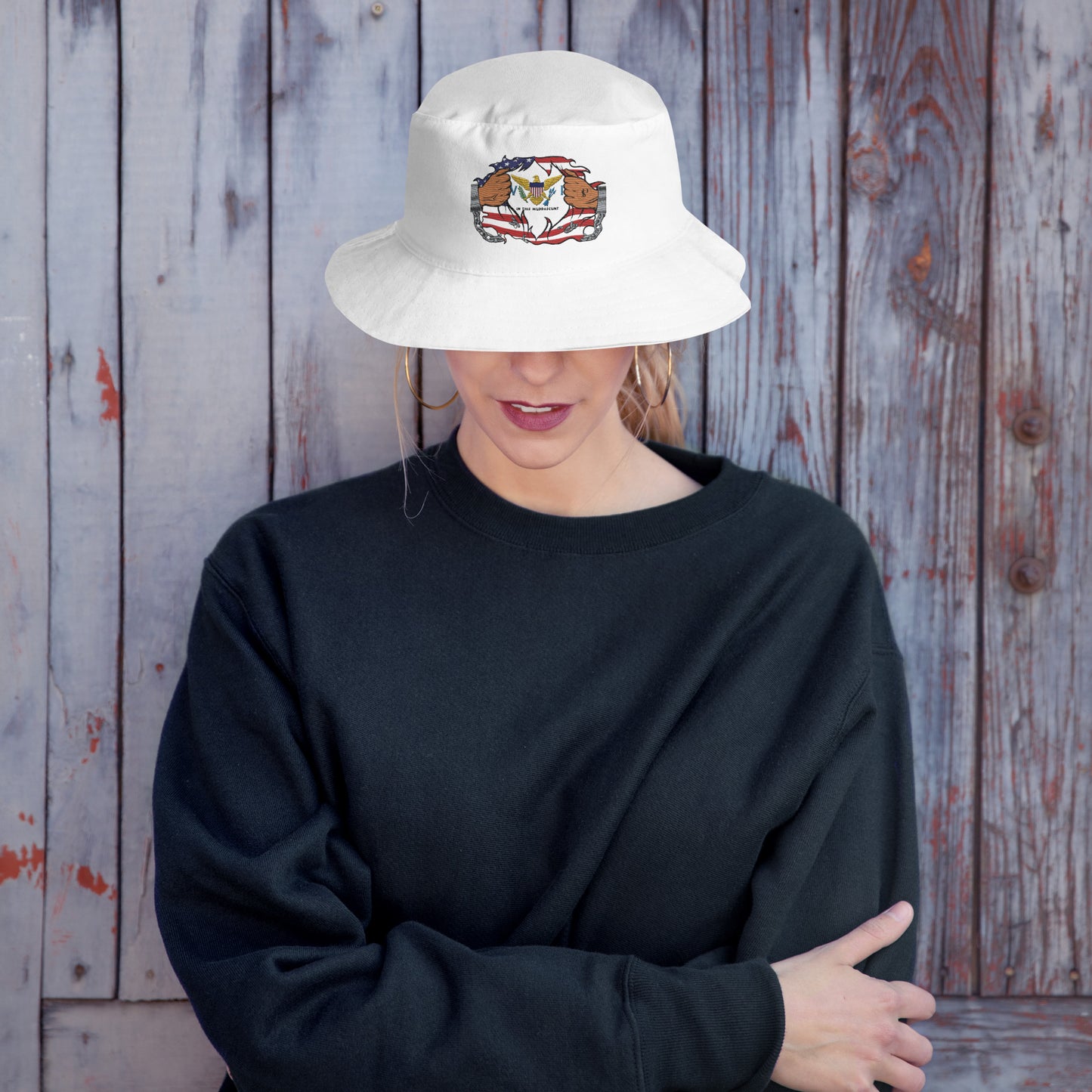 a woman wearing a white hat with a tiger on it