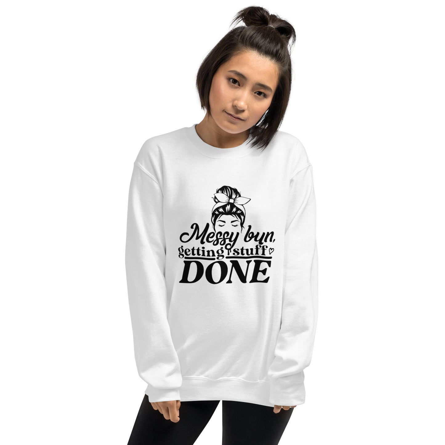 a woman wearing a white sweatshirt with a black and white quote on it