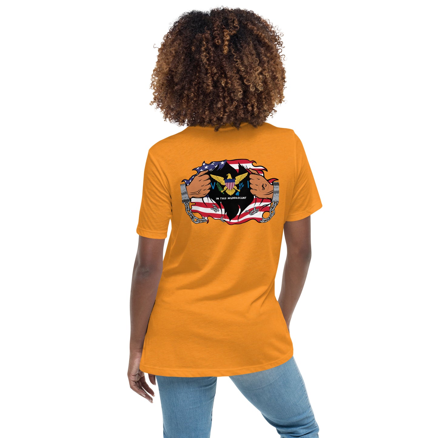 a woman wearing an orange t - shirt with a picture of an eagle on it