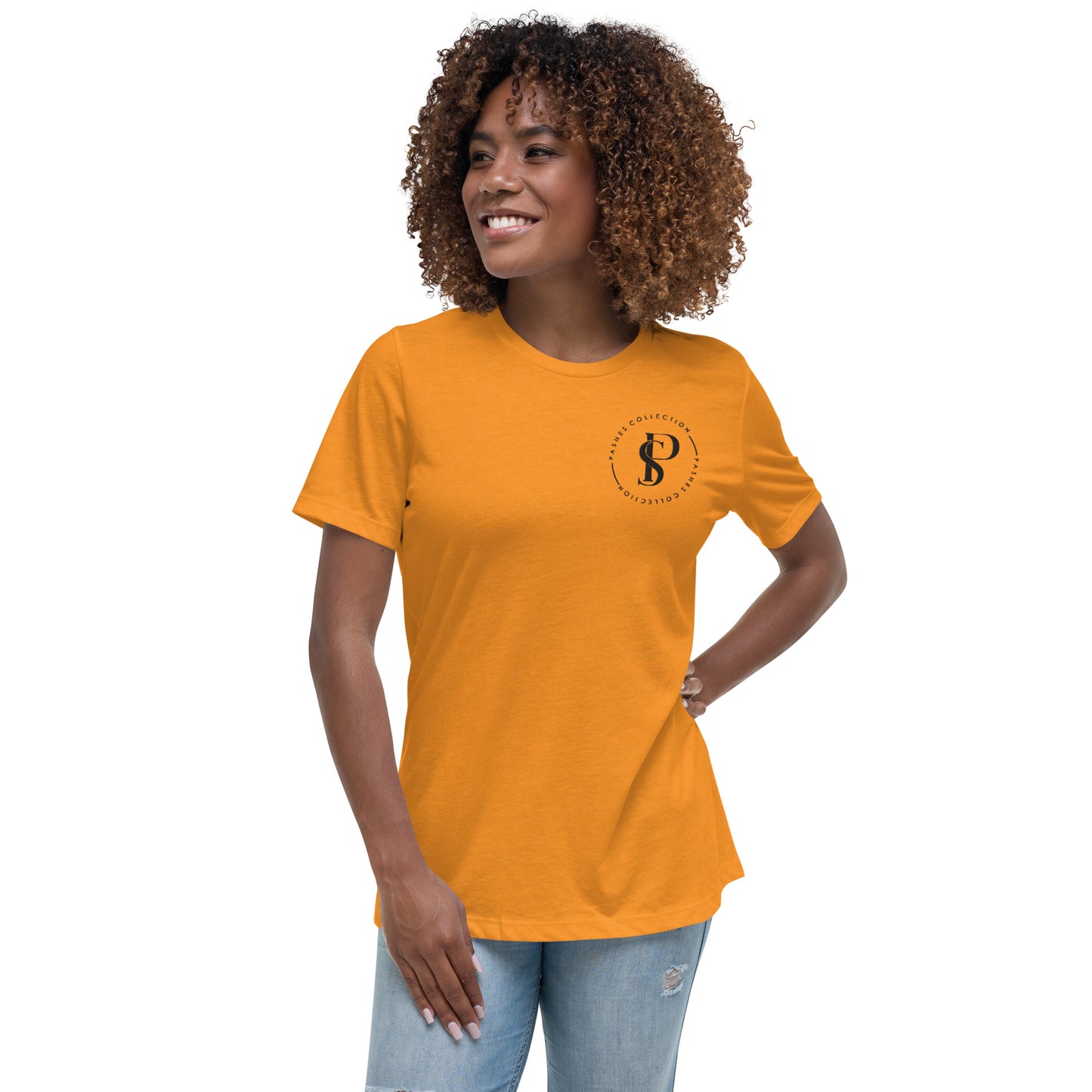 a woman wearing an orange t - shirt with the letter s on it