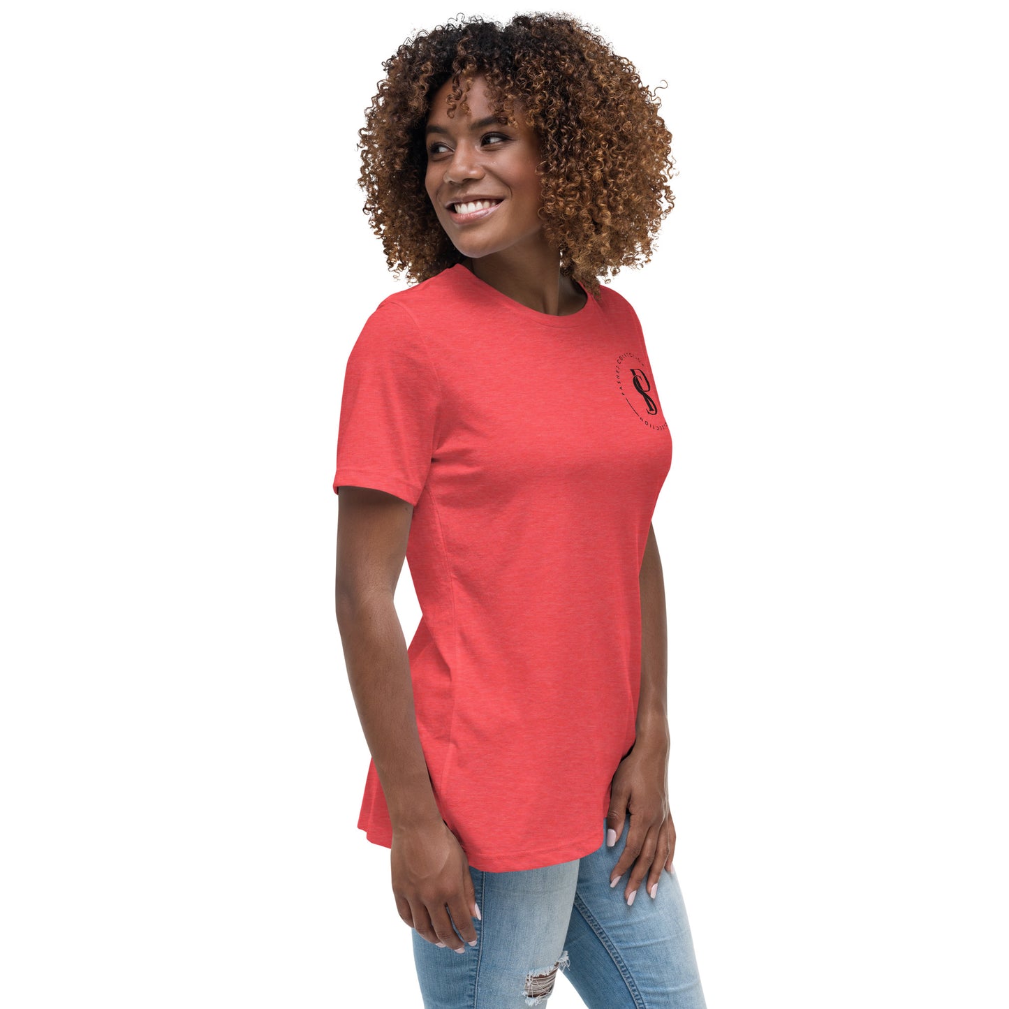 a woman with curly hair wearing a red t - shirt
