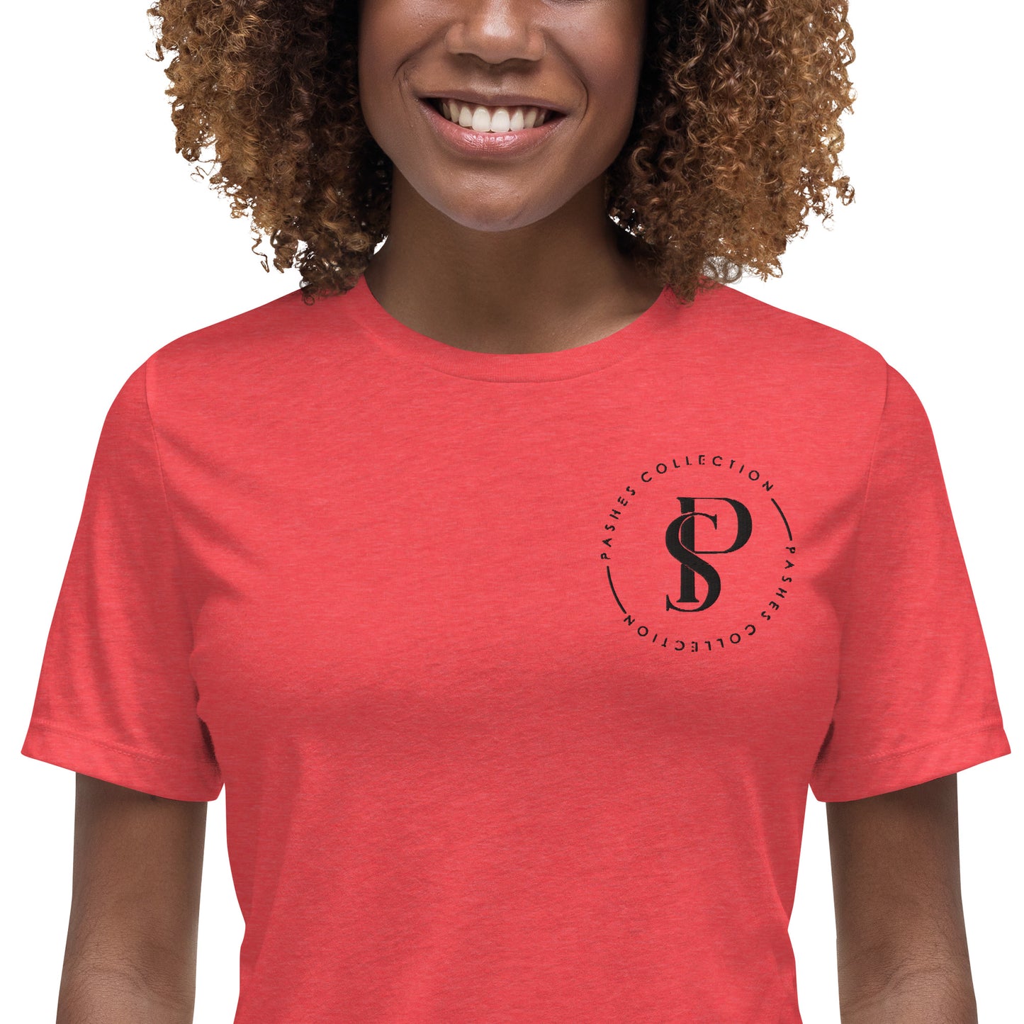 a woman with curly hair wearing a red shirt