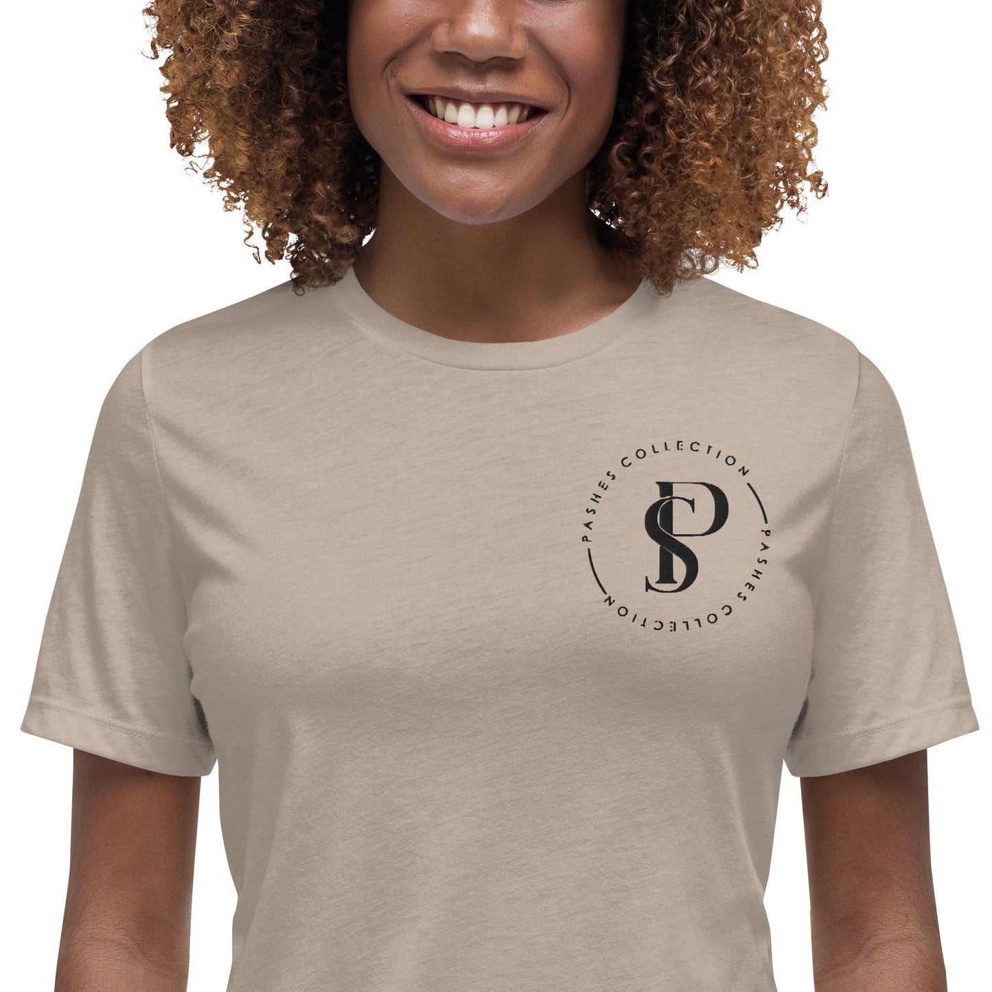 a woman with curly hair wearing a t - shirt