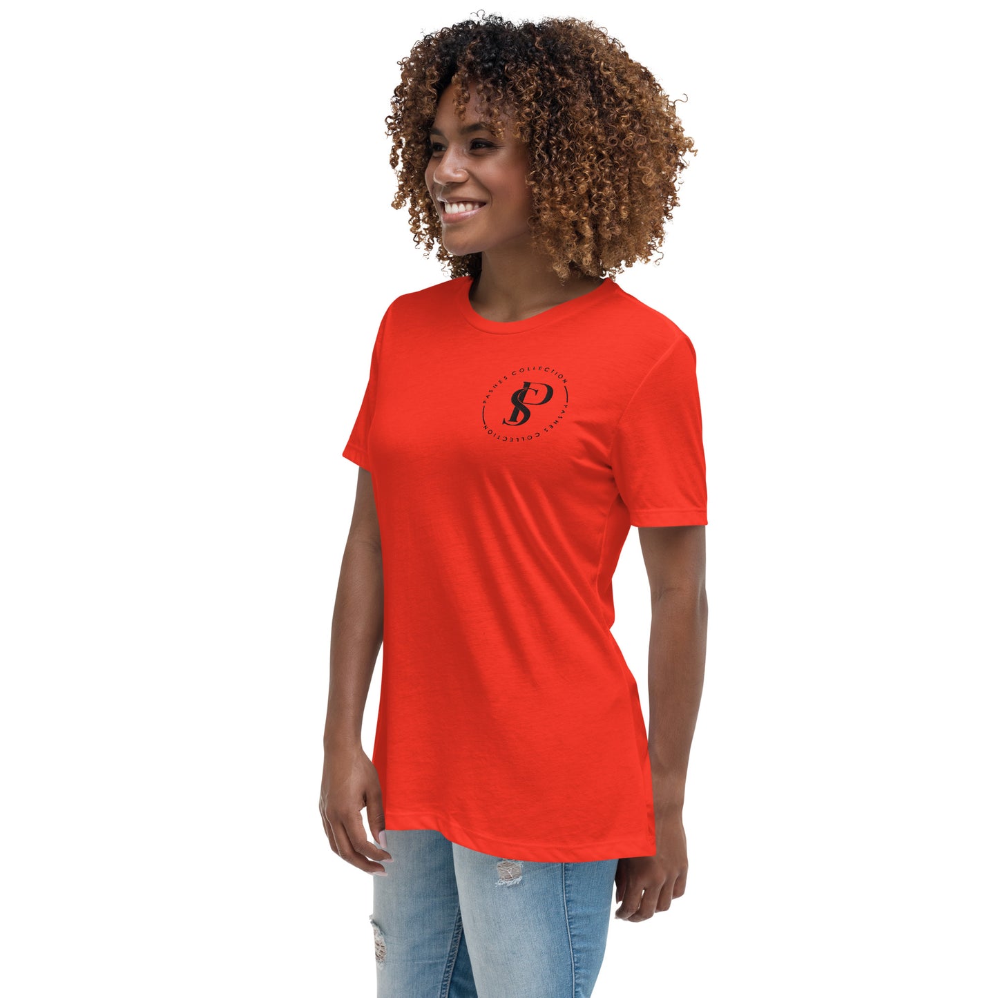 a woman wearing a red t - shirt and jeans